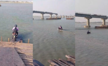 Motorcyclist riding through river