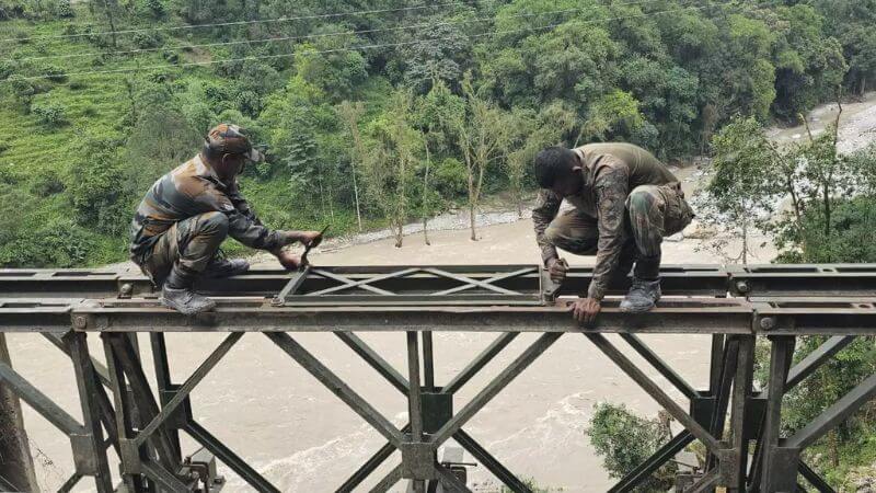 Indian Army building bridge